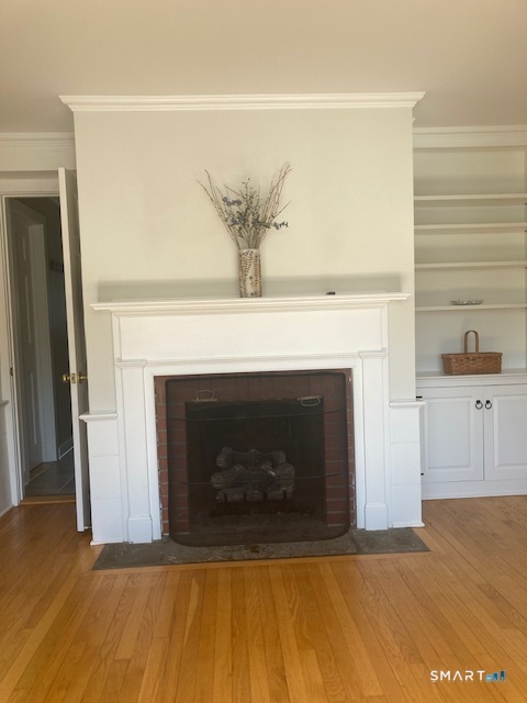 88 Knox Road Litchfield, CT 06759 - Photo 20 of 28 a living room with a fireplace