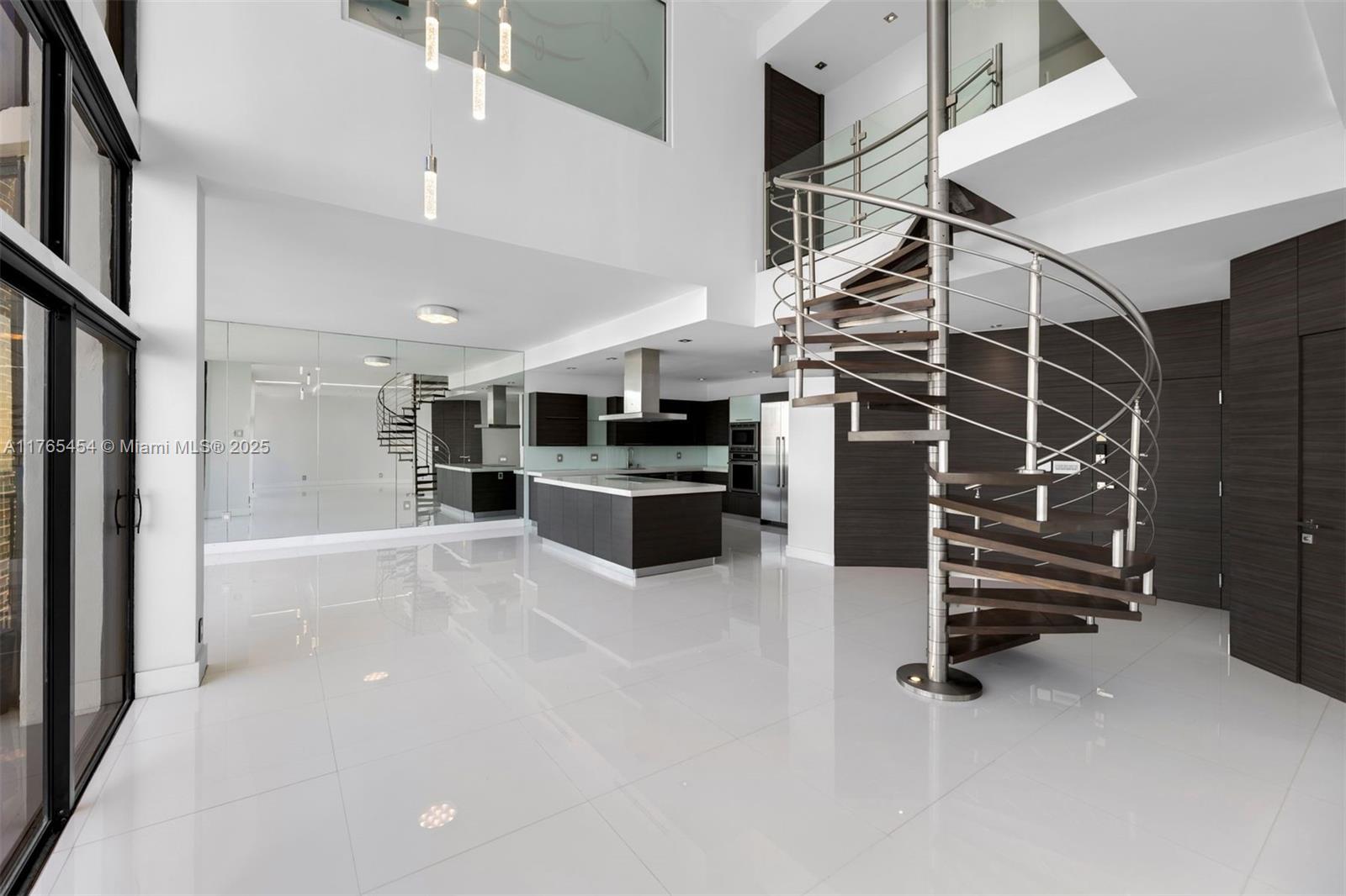 1925 Brickell Avenue, Unit DPH7 Miami, FL 33129 - Photo 12 of 45 a view of kitchen with furniture and a kitchen