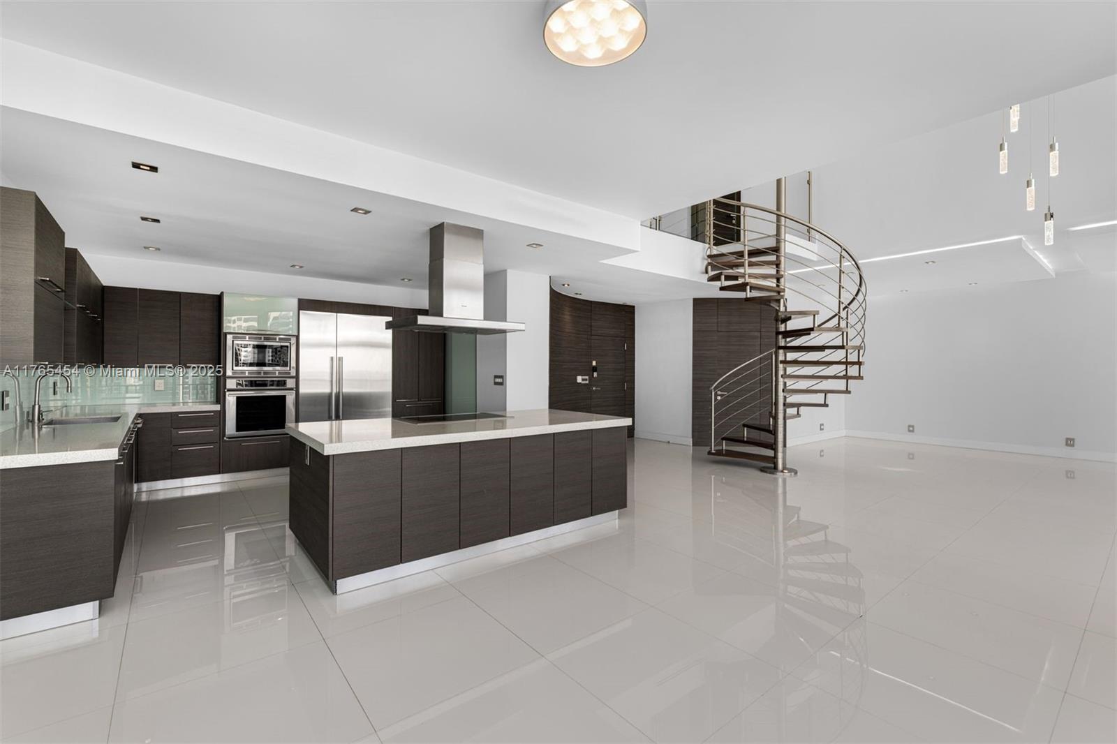 1925 Brickell Avenue, Unit DPH7 Miami, FL 33129 - Photo 26 of 45 a living room with furniture and a flat screen tv