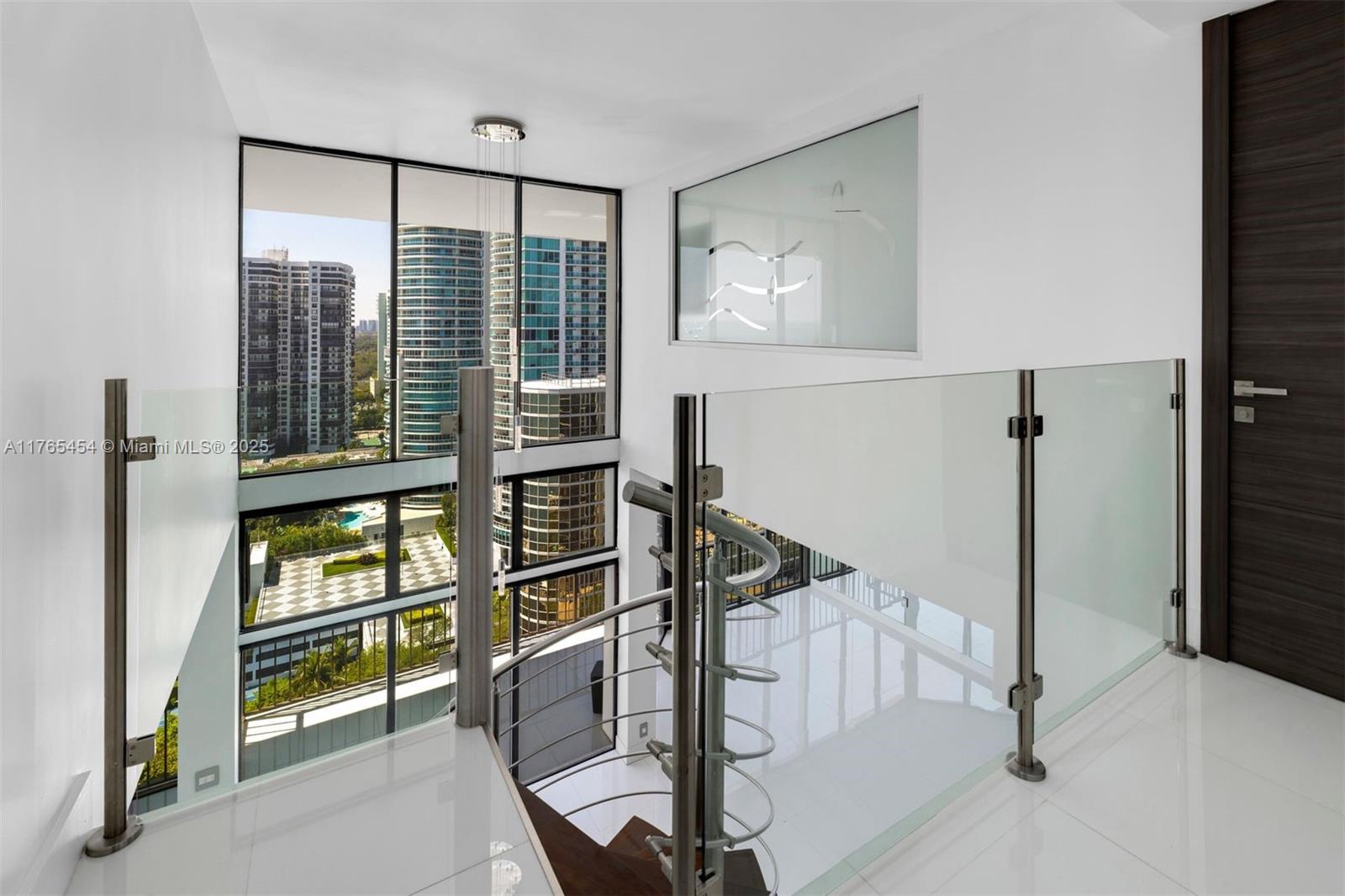1925 Brickell Avenue, Unit DPH7 Miami, FL 33129 - Photo 30 of 45 a view of an entryway with a door