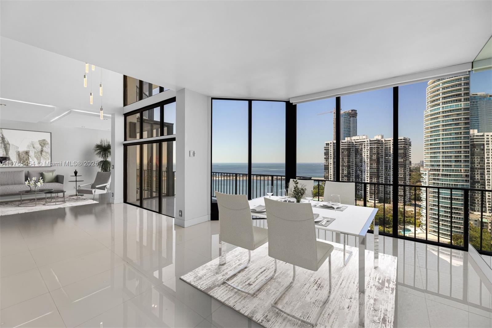 1925 Brickell Avenue, Unit DPH7 Miami, FL 33129 - Photo 3 of 45 a view of a living room filled with furniture and large windows