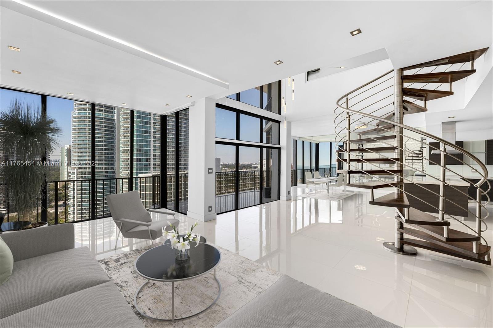 1925 Brickell Avenue, Unit DPH7 Miami, FL 33129 - Photo 5 of 45 a living room with furniture