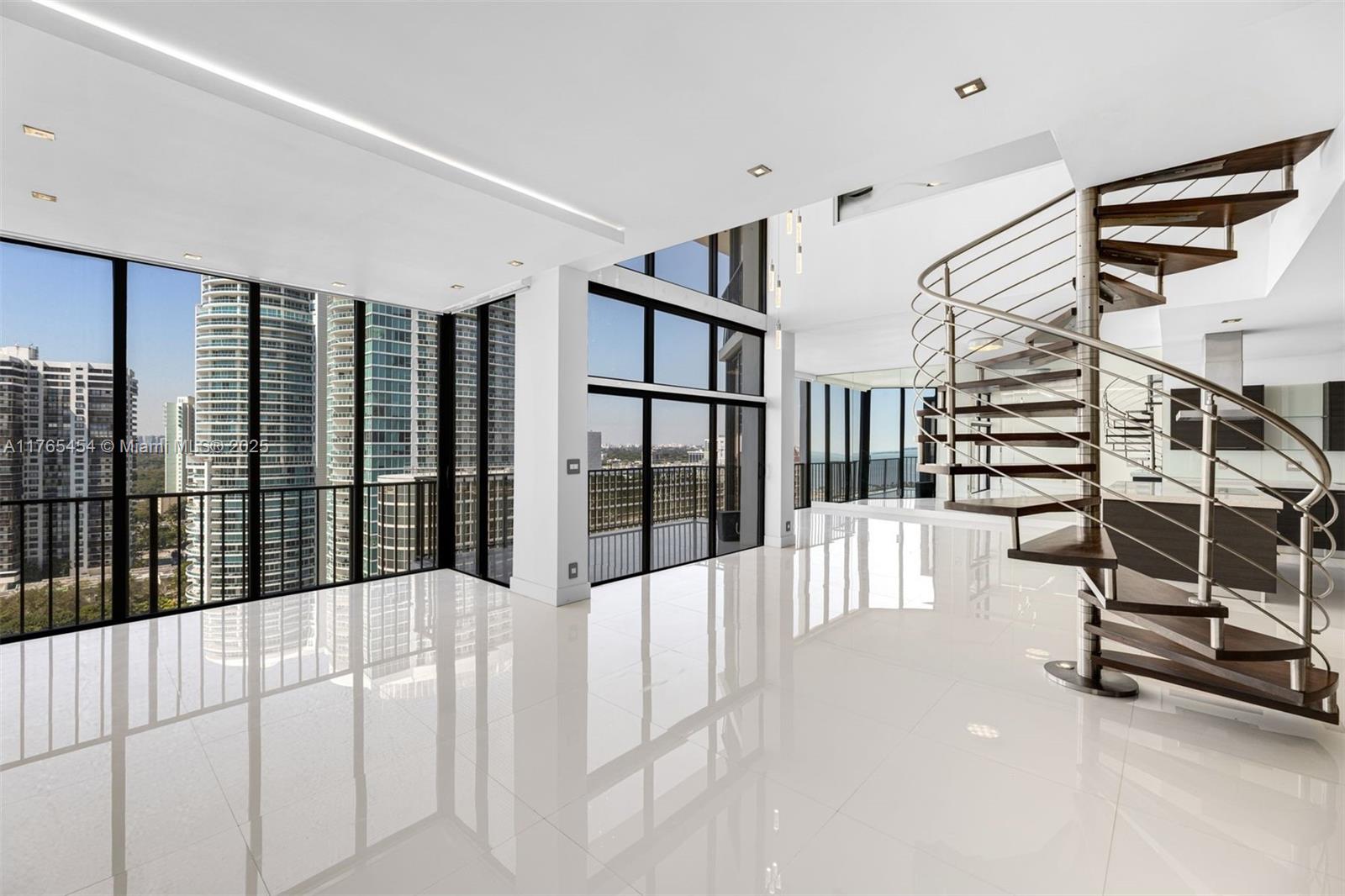 1925 Brickell Avenue, Unit DPH7 Miami, FL 33129 - Photo 6 of 45 a view of a living room and entryway