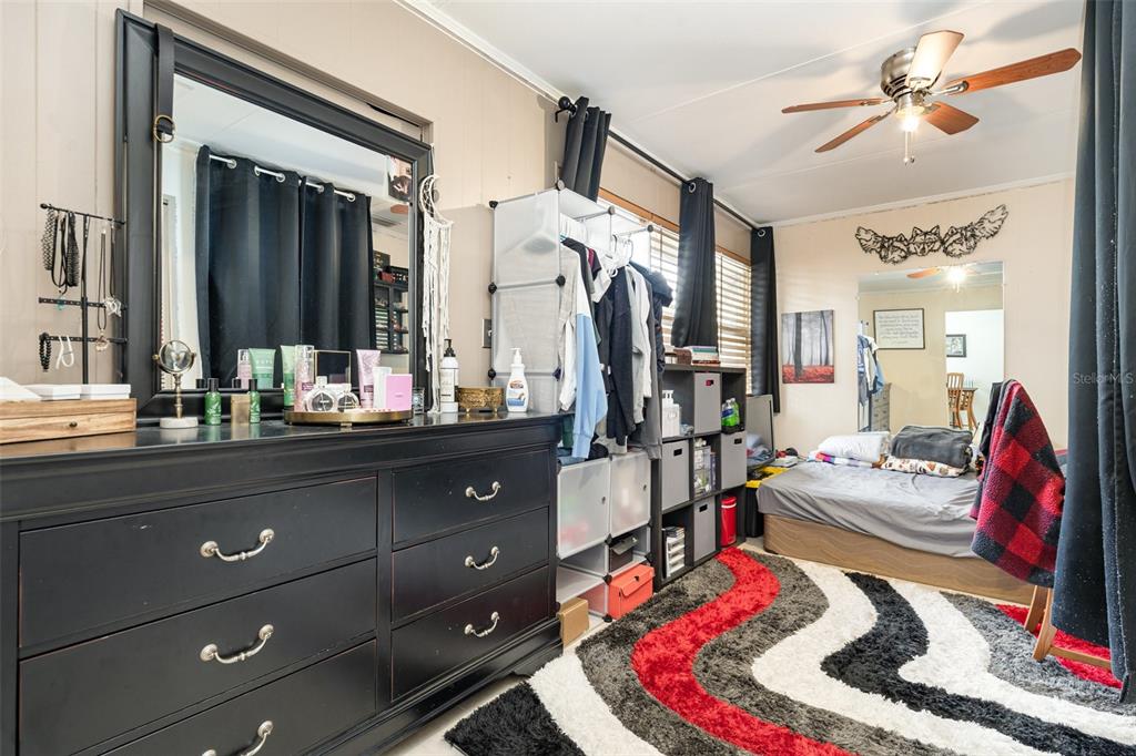 1107 Cable Lane Northeast Palm Bay, FL 32905 - Photo 6 of 17 a living room with furniture and a wooden floor