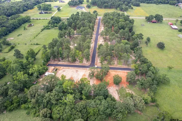 a view of a garden from a balcony