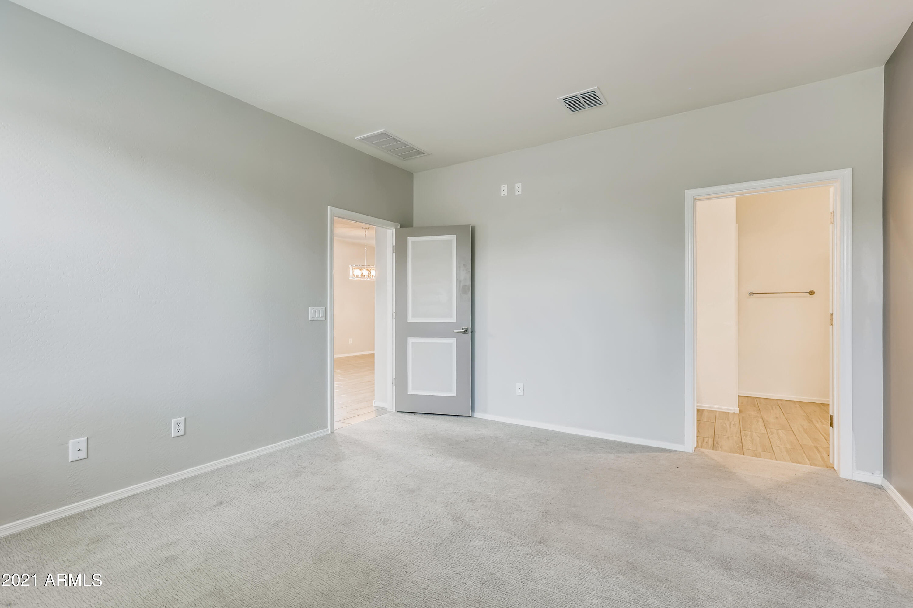 42139 West Cribbage Road Maricopa, AZ 85138 - Photo 19 of 33 18-304741876-29 Primary Bedroom