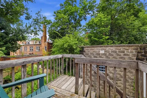 a view of a pathway with a house