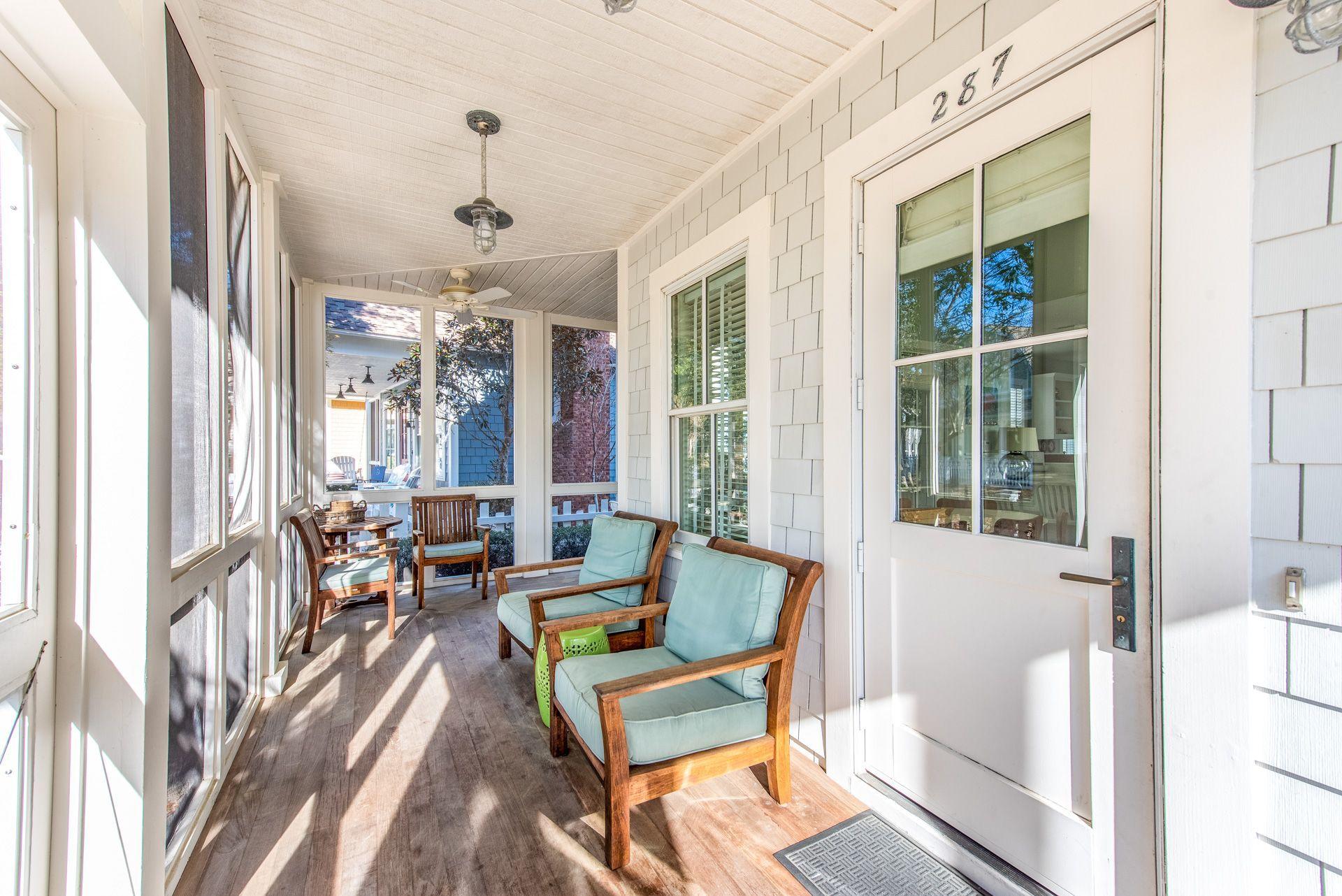 287 Salt Lane Watersound, FL 32461 - Photo 34 of 38 a living room with furniture and a large window