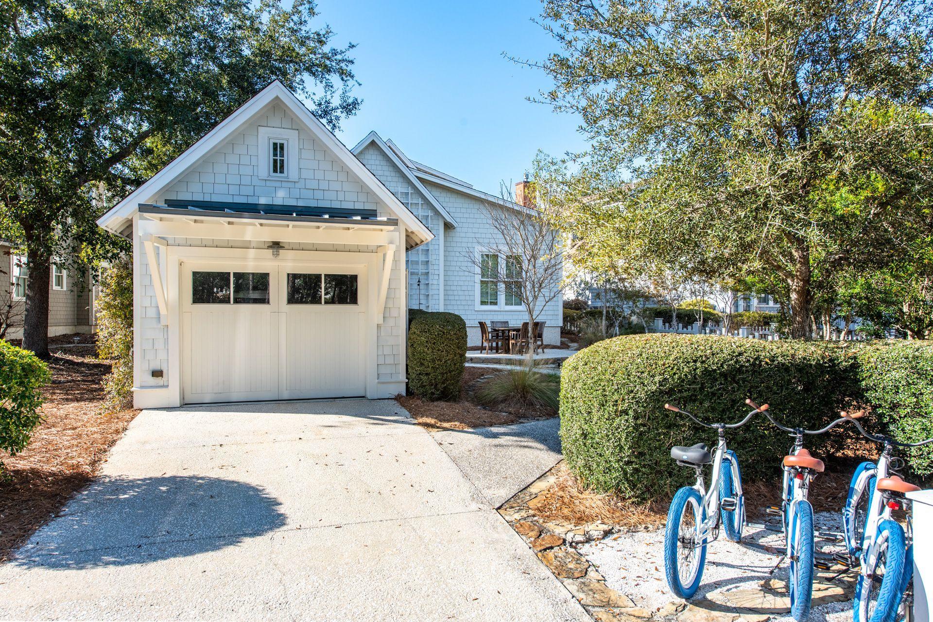 287 Salt Lane Watersound, FL 32461 - Photo 37 of 38 a front view of a house with garden