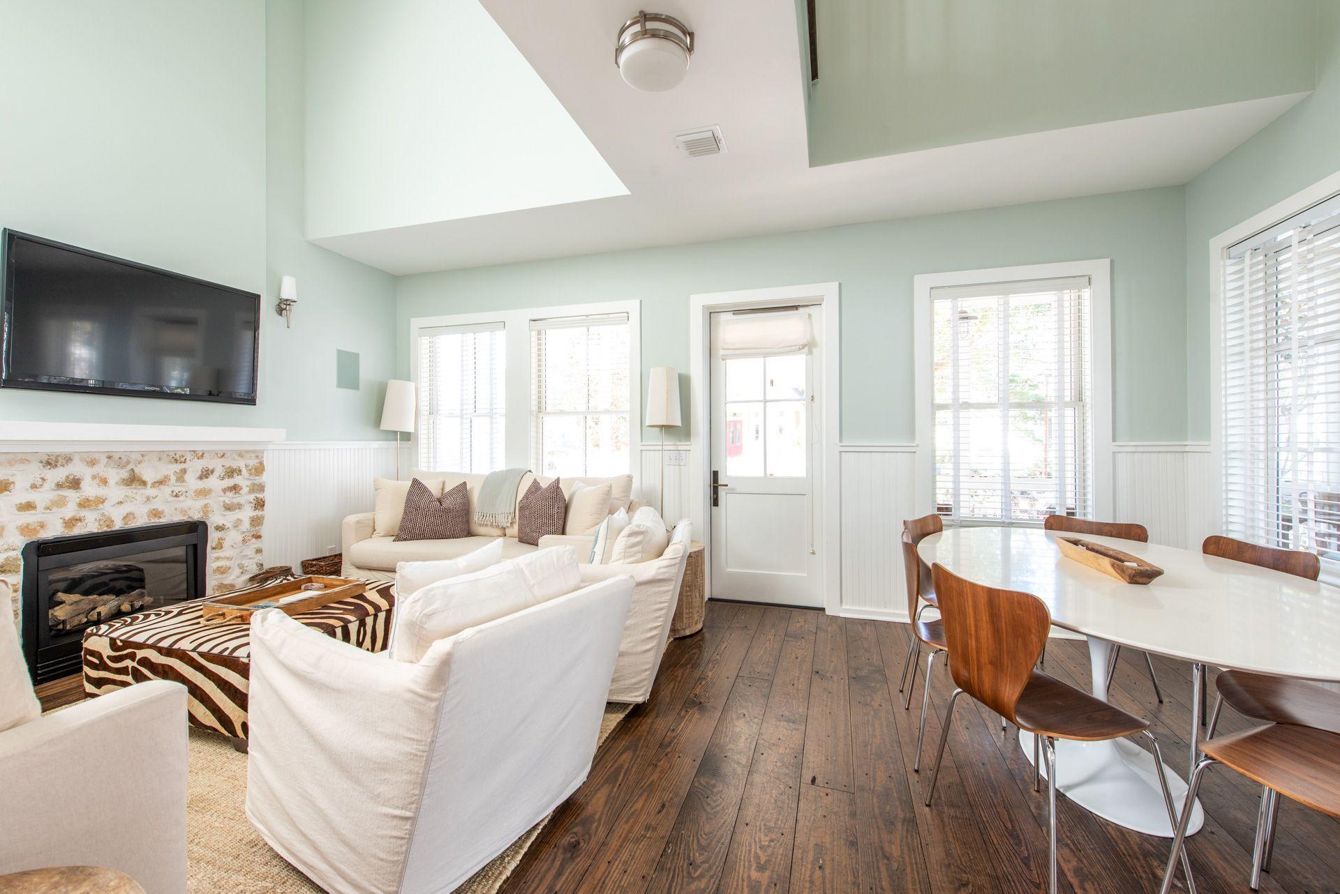 287 Salt Lane Watersound, FL 32461 - Photo 6 of 38 a living room with fireplace furniture and a flat screen tv