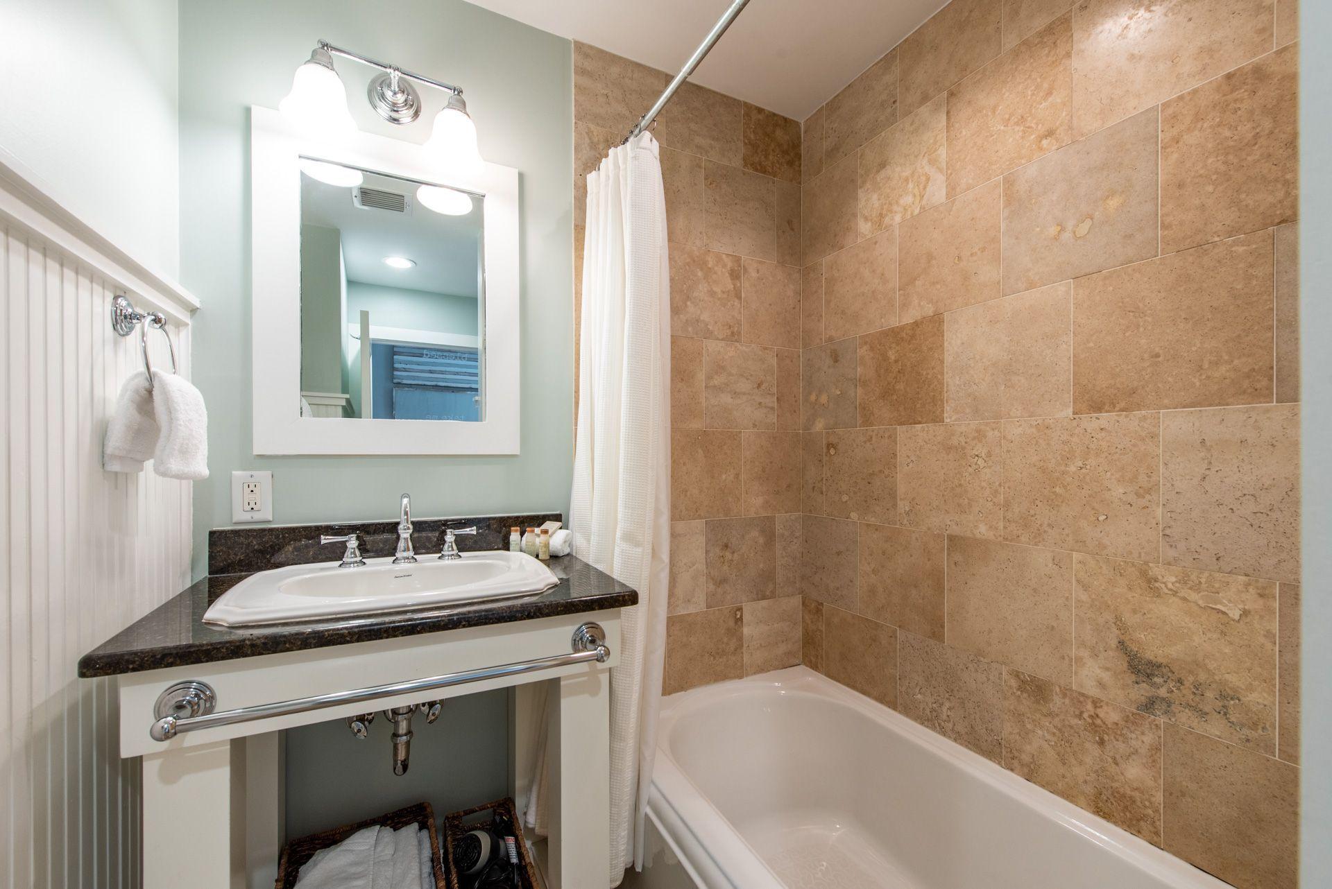 287 Salt Lane Watersound, FL 32461 - Photo 9 of 38 a bathroom with a sink and a mirror
