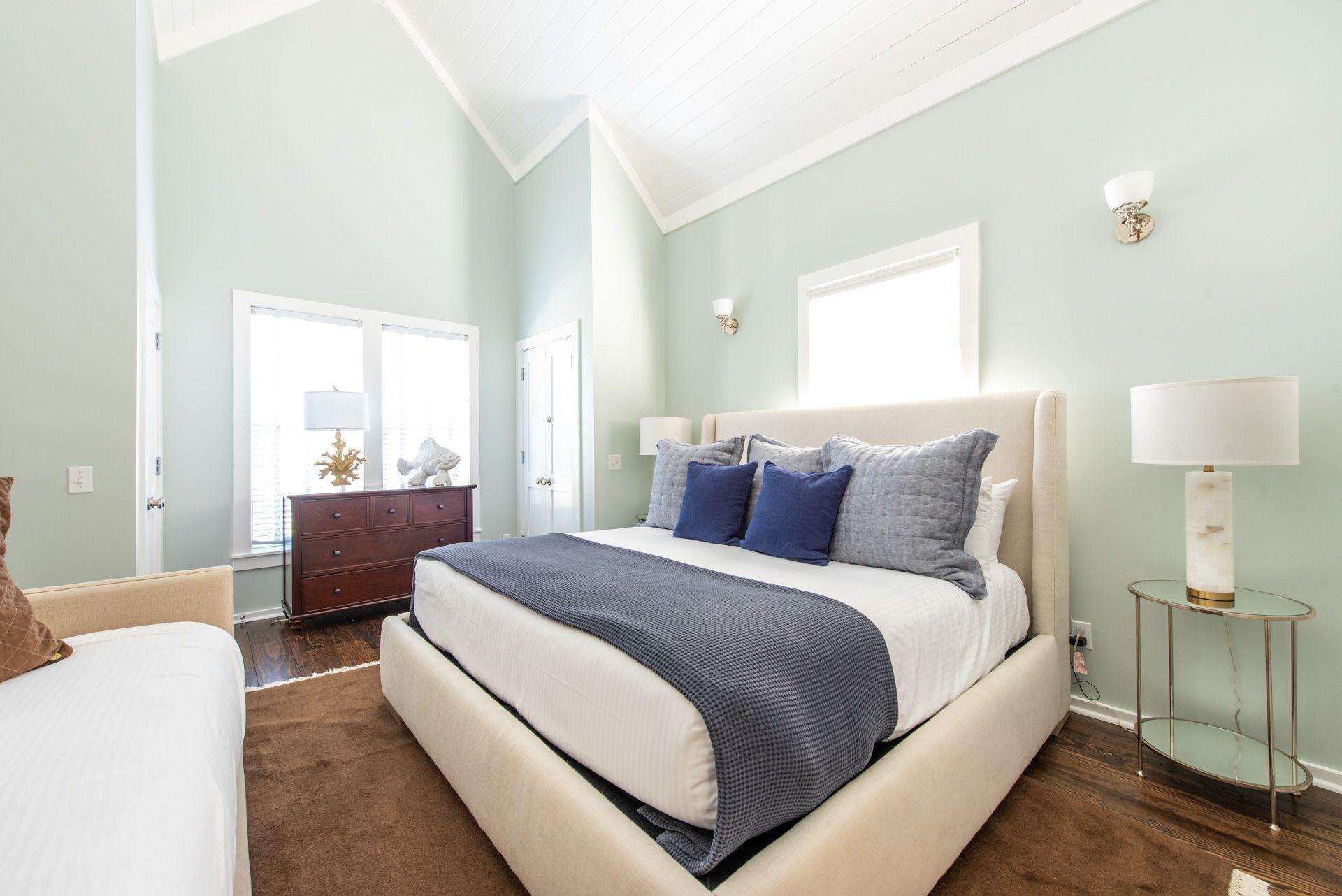 287 Salt Lane Watersound, FL 32461 - Photo 10 of 38 a bedroom with a bed and a couch