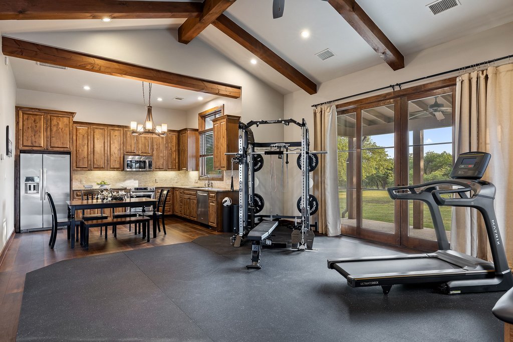 2560 Bell Springs Road Dripping Springs, TX 78620 - Photo 34 of 40 a view of a room with gym equipment