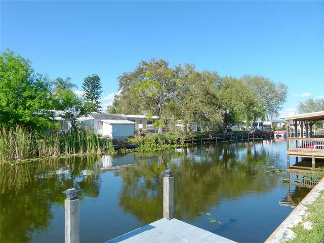 a lake view with a yard