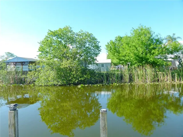a view of a lake with houses