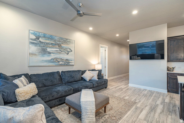 2600 Ocotillo Way, Unit 31 Santa Clara, UT 84765 - Photo 14 of 73 Living area featuring recessed lighting, a ceiling fan, and wood-finish flooring