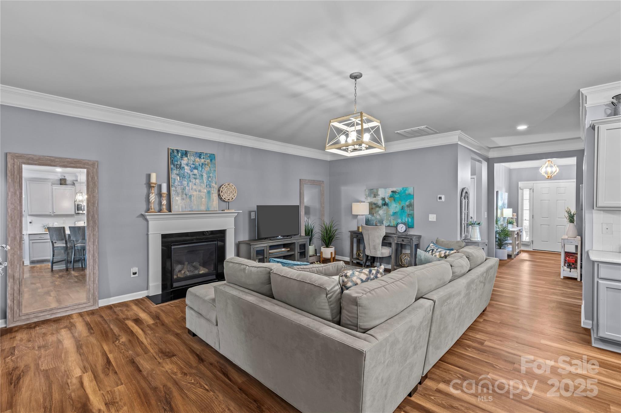 8097 Asher Chase Trail Lancaster, SC 29720 - Photo 13 of 47 a living room with furniture and a fireplace