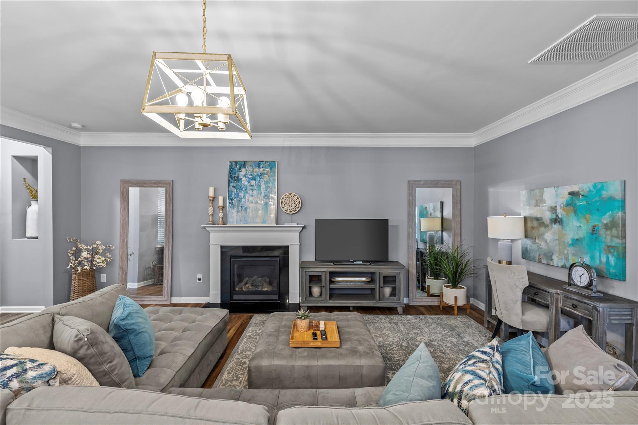 8097 Asher Chase Trail Lancaster, SC 29720 - Photo 14 of 47 a living room with furniture a fireplace and a flat screen tv