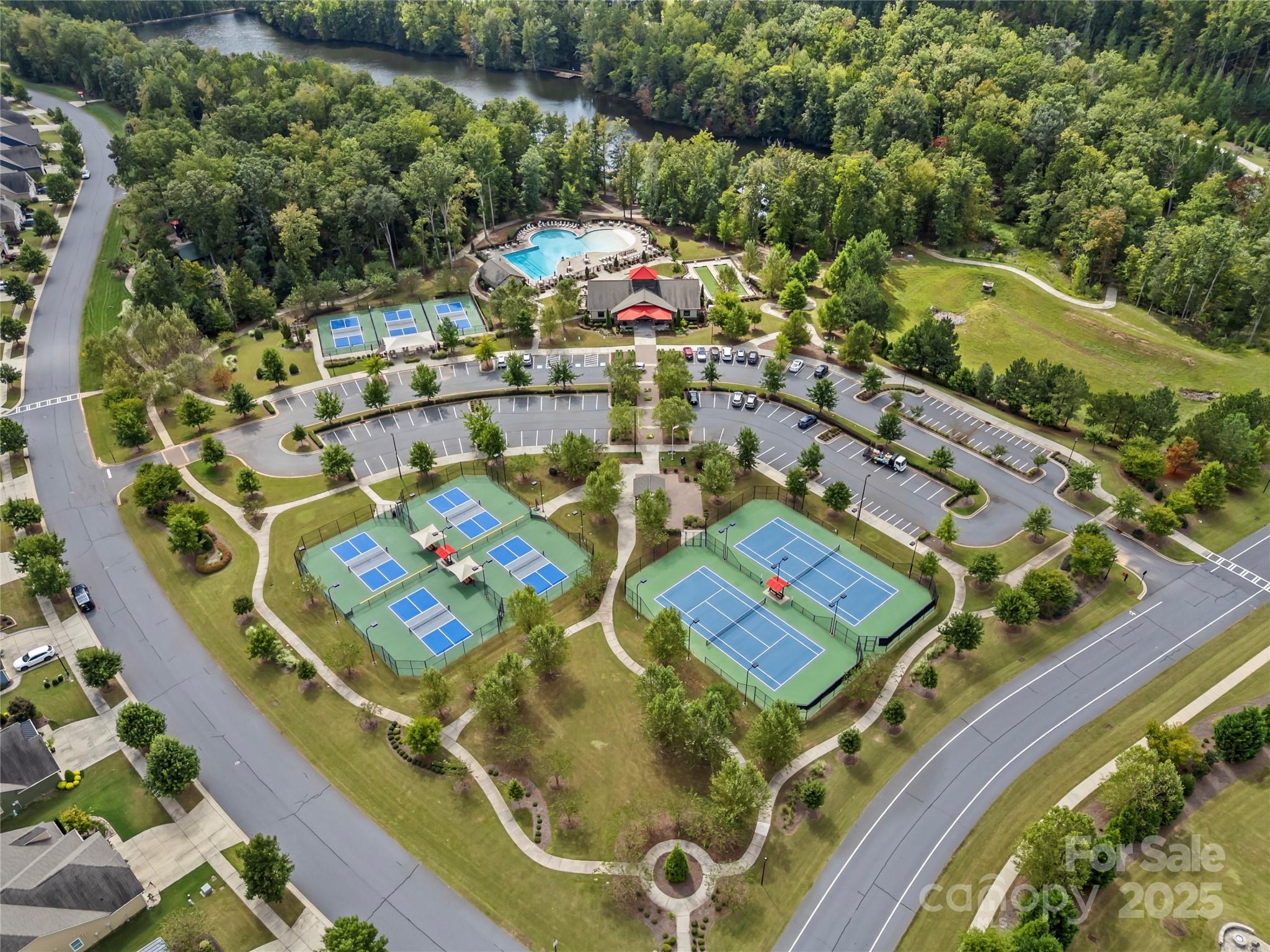 8097 Asher Chase Trail Lancaster, SC 29720 - Photo 40 of 47 an aerial view of a pool patio swimming pool and outdoor seating
