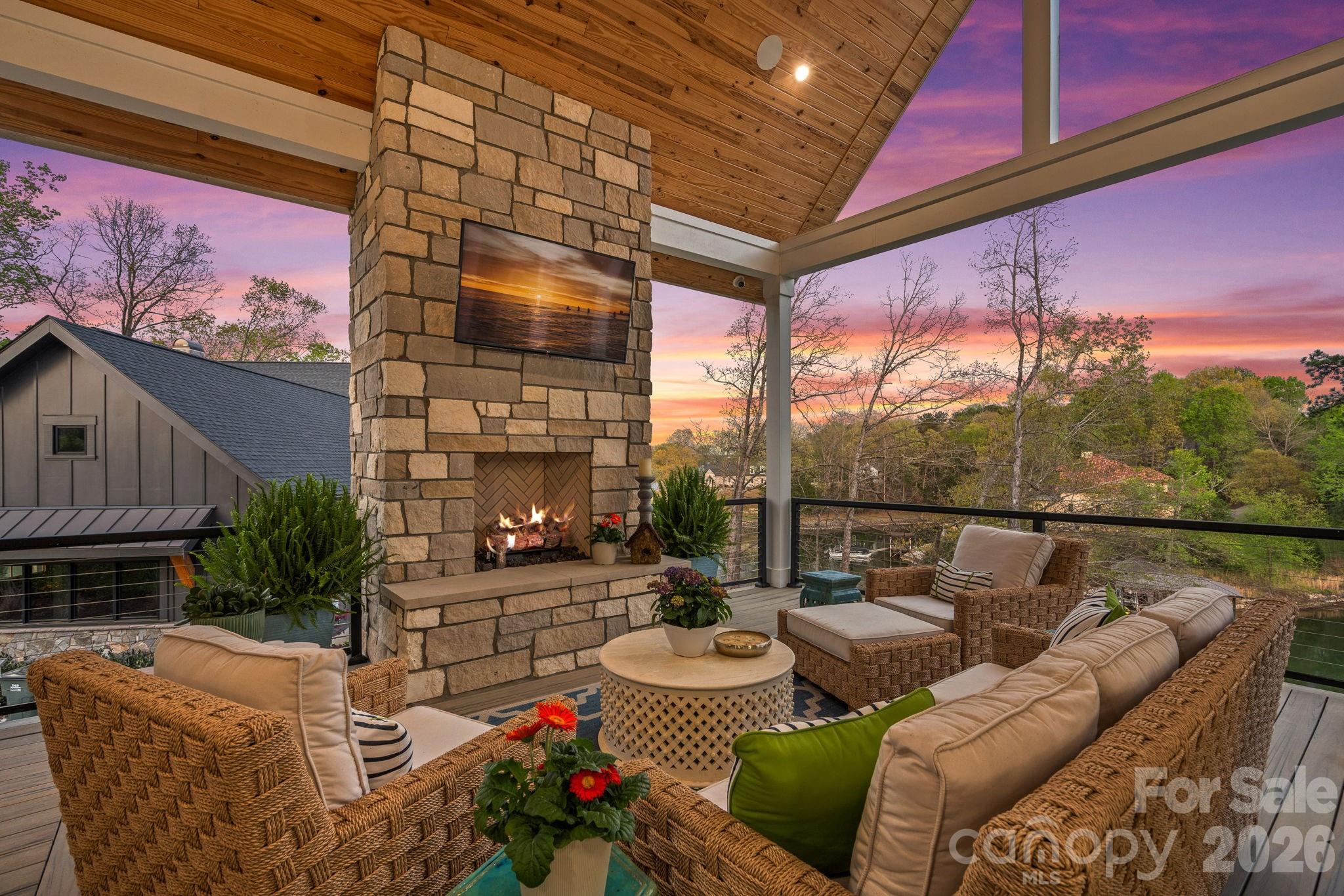 5907 Kiowa Road Clover, SC 29710 - Photo 3 of 47 a balcony with furniture and a fireplace