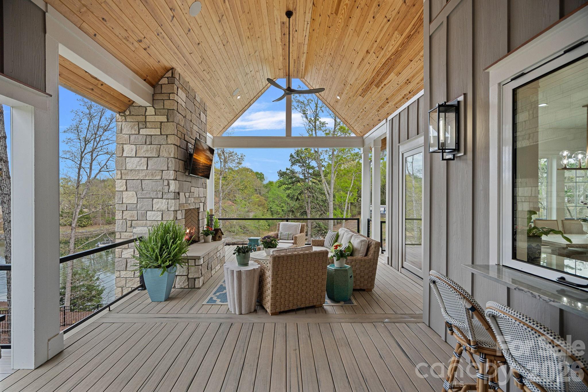 5907 Kiowa Road Clover, SC 29710 - Photo 37 of 47 a balcony with couch and wooden floor