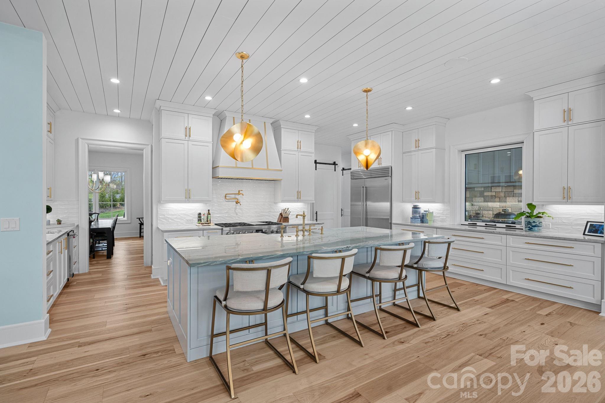 5907 Kiowa Road Clover, SC 29710 - Photo 7 of 47 a large kitchen with a table and chairs