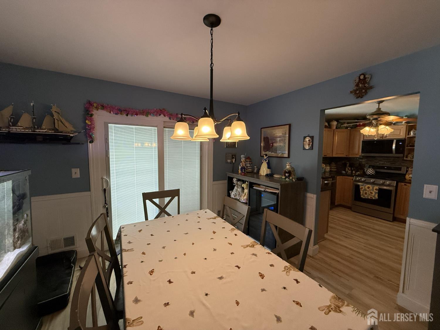 15 Sutton Place Helmetta, NJ 08828 - Photo 21 of 27 a kitchen with stainless steel appliances granite countertop a sink a stove and a wooden floors