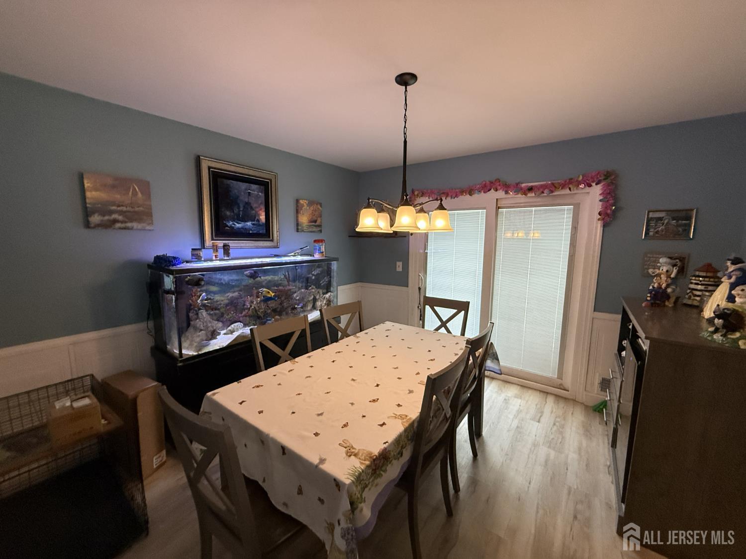 15 Sutton Place Helmetta, NJ 08828 - Photo 22 of 27 a view of a dining room with furniture window and wooden floor