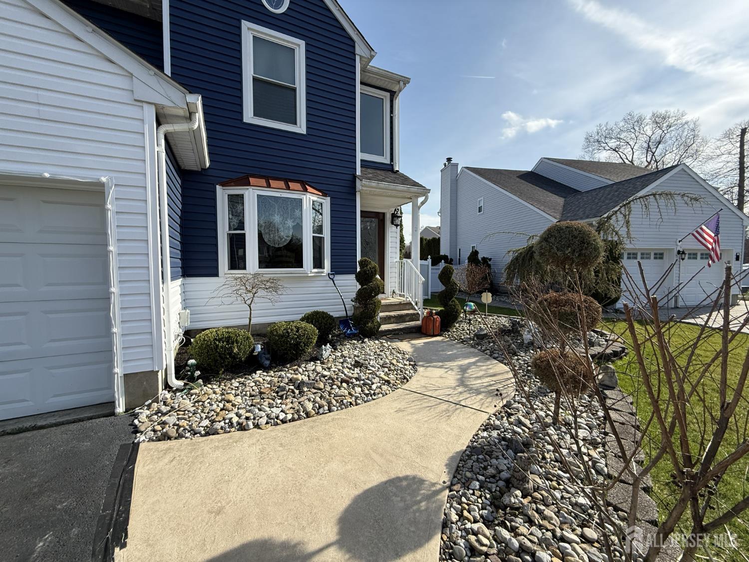 15 Sutton Place Helmetta, NJ 08828 - Photo 23 of 27 a view of a house with a yard and sitting area
