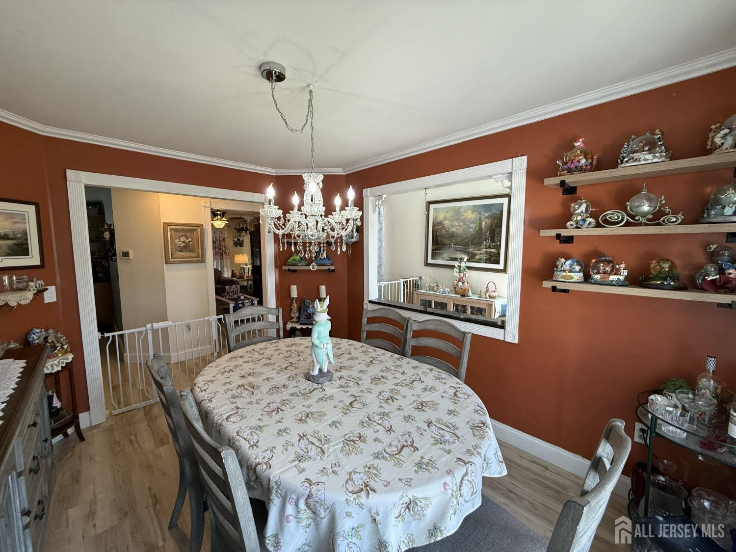 15 Sutton Place Helmetta, NJ 08828 - Photo 4 of 27 a dining room with wooden floor and chandelier