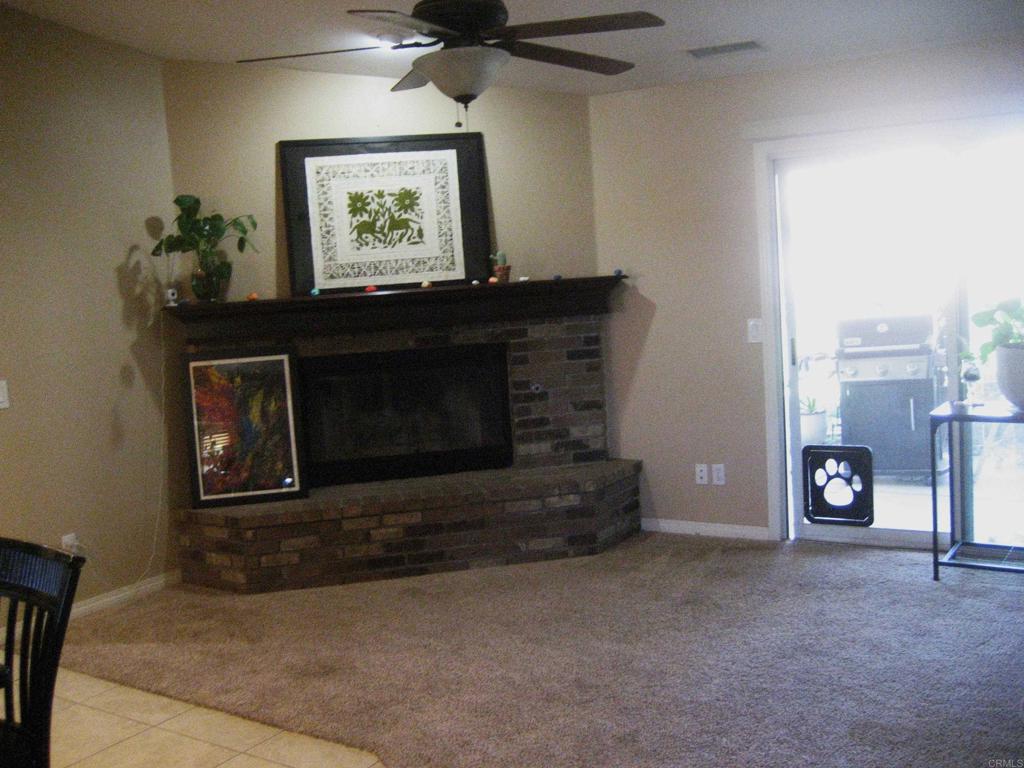 29175 The Yellow Brick Road Valley Center, CA 92082 - Photo 11 of 17 a living room with furniture and a fireplace