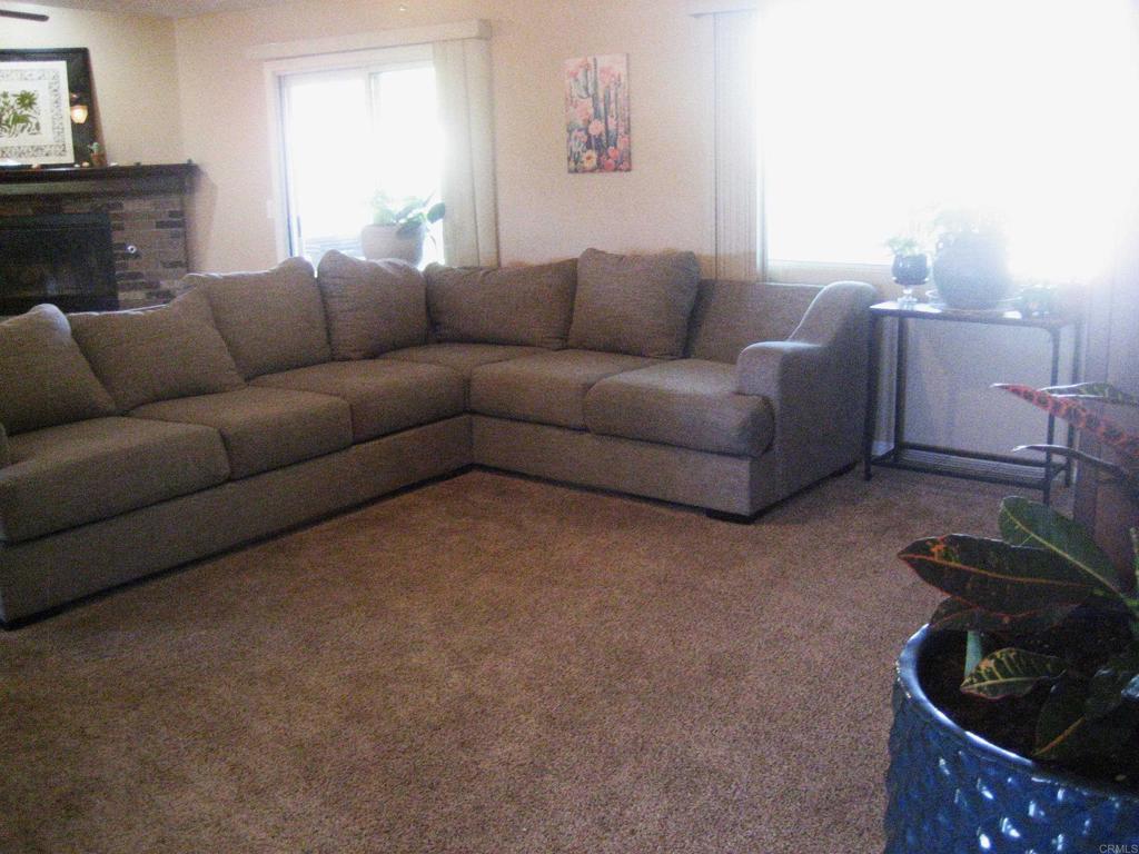 29175 The Yellow Brick Road Valley Center, CA 92082 - Photo 13 of 17 a living room with furniture and a fireplace