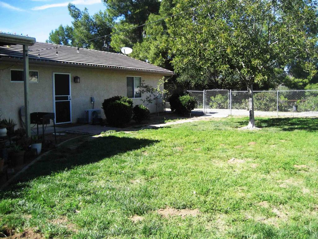 29175 The Yellow Brick Road Valley Center, CA 92082 - Photo 3 of 17 a view of a house with backyard and porch