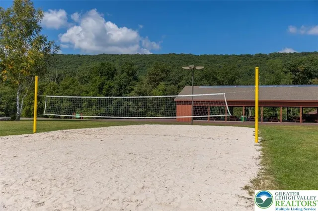 a view of a wooden floor and lake view