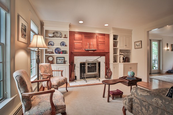 196 Middle Road Newbury, MA 01922 - Photo 12 of 28 a living room with furniture a fireplace and a large window