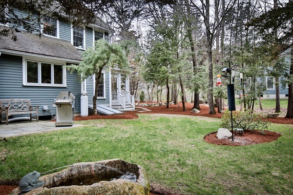 196 Middle Road Newbury, MA 01922 - Photo 24 of 28 a front view of a house with a yard