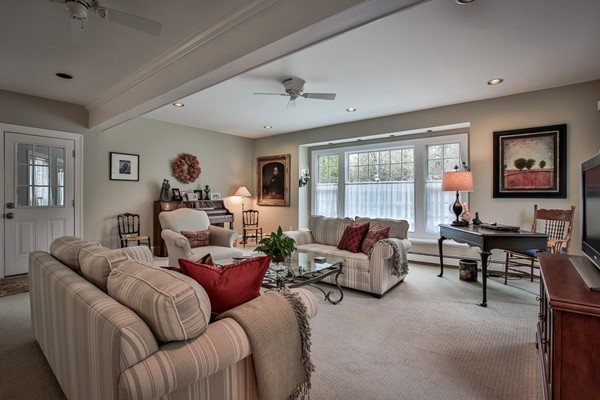 196 Middle Road Newbury, MA 01922 - Photo 5 of 28 a living room with furniture ceiling fan and a window