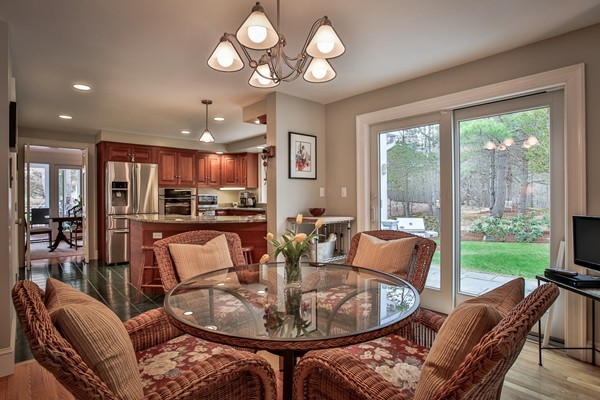 196 Middle Road Newbury, MA 01922 - Photo 7 of 28 a dining room with furniture a large window and wooden floor