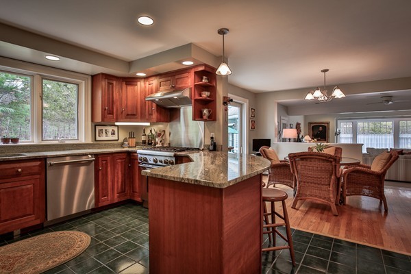 196 Middle Road Newbury, MA 01922 - Photo 9 of 28 a kitchen with lots of counter top space dining table and appliances