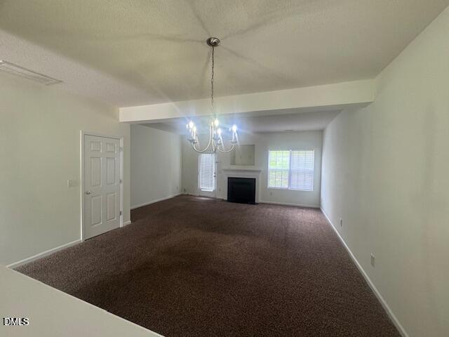 3363 Bridgeville Road Raleigh, NC 27610 - Photo 3 of 10 a view of empty room with window and fireplace
