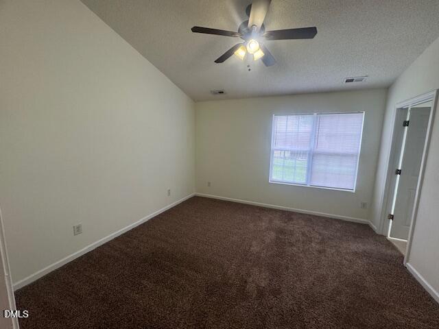 3363 Bridgeville Road Raleigh, NC 27610 - Photo 5 of 10 an empty room with a window and a fan
