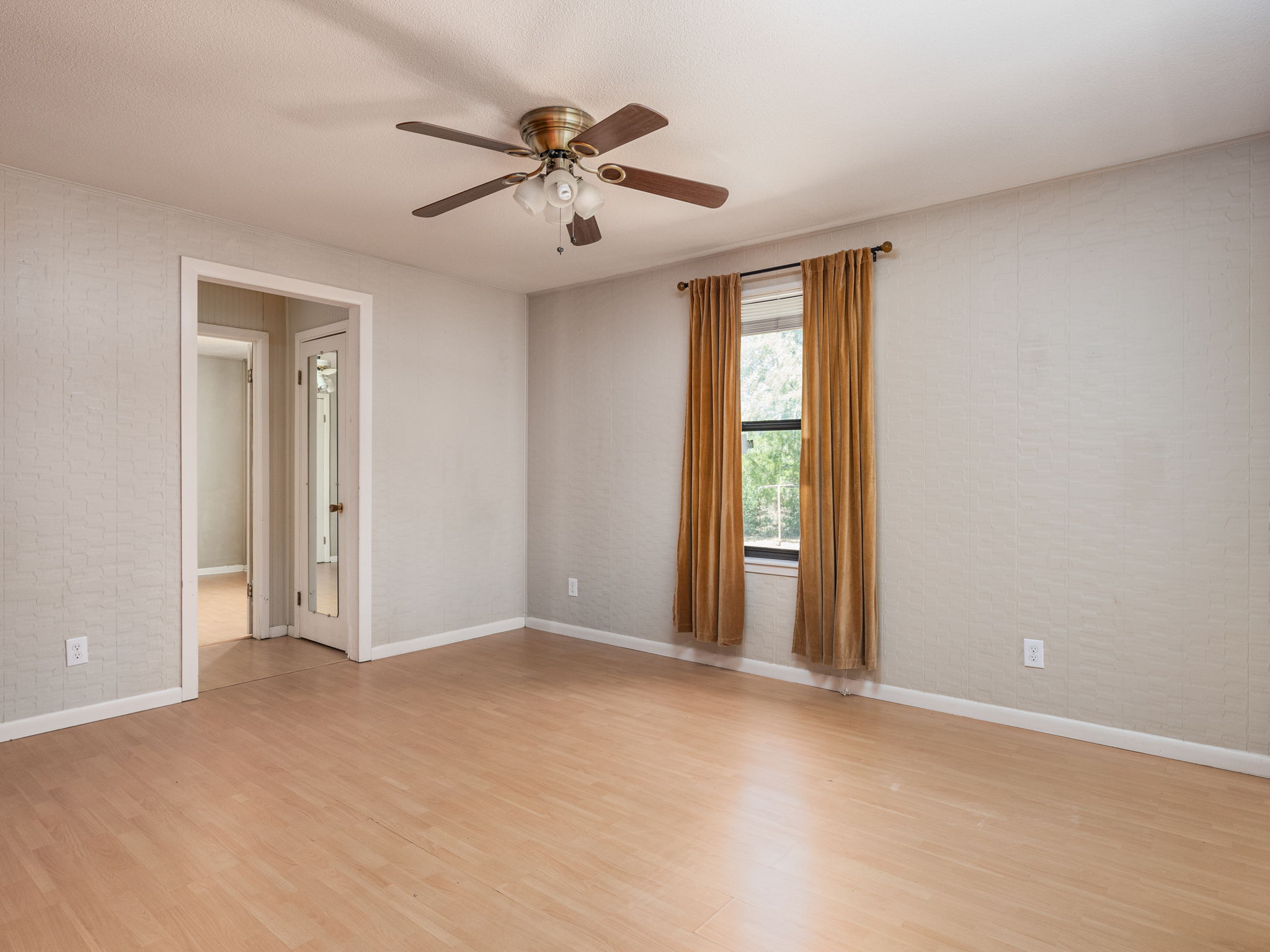 1949 County Road 347 Loop Gause, TX 77857 - Photo 11 of 32 a view of an empty room with a window