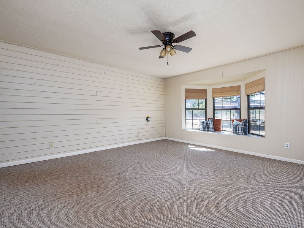 1949 County Road 347 Loop Gause, TX 77857 - Photo 12 of 32 a view of an empty room with a window