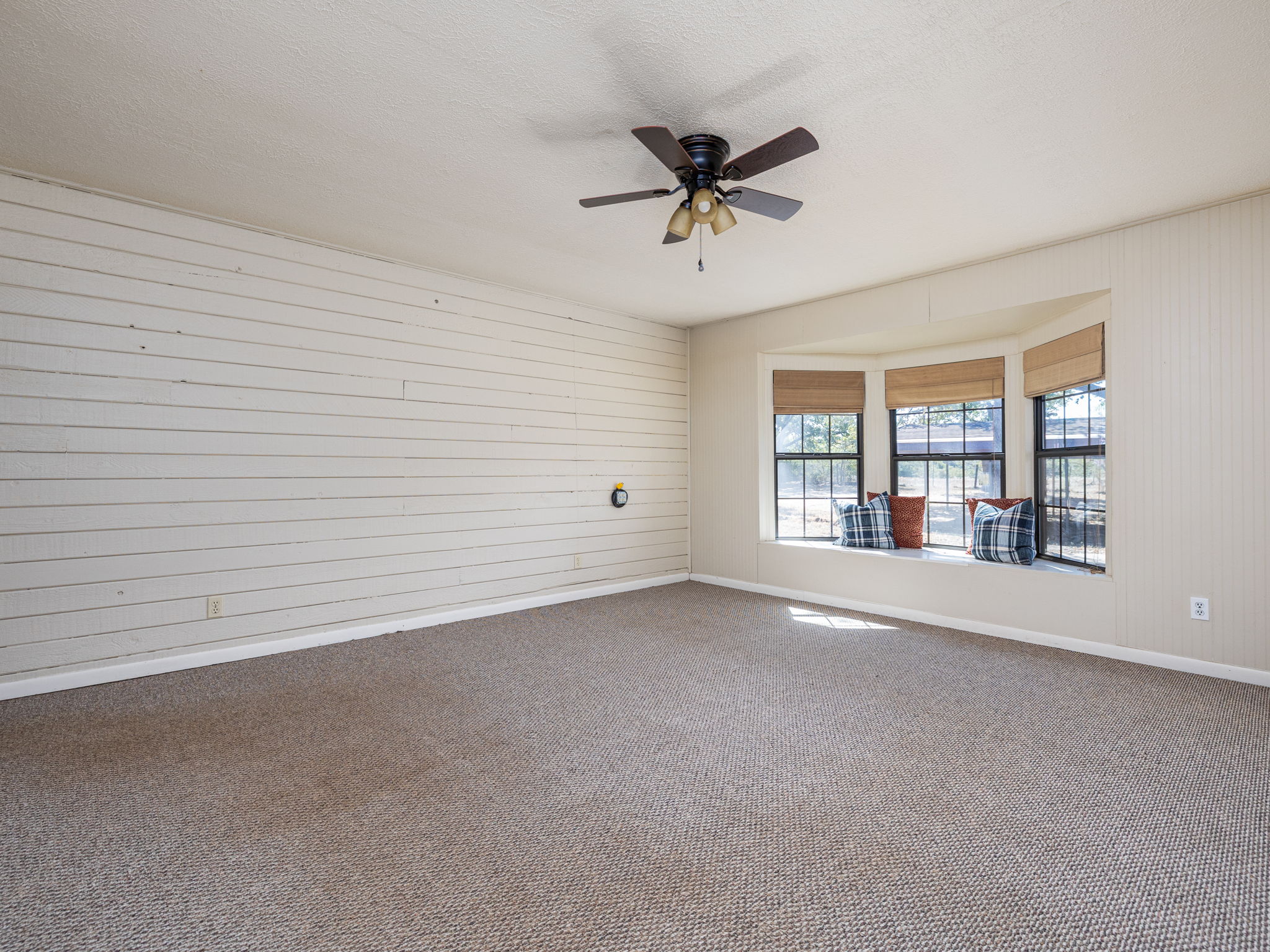 1949 County Road 347 Loop Gause, TX 77857 - Photo 13 of 32 a view of an empty room with a window