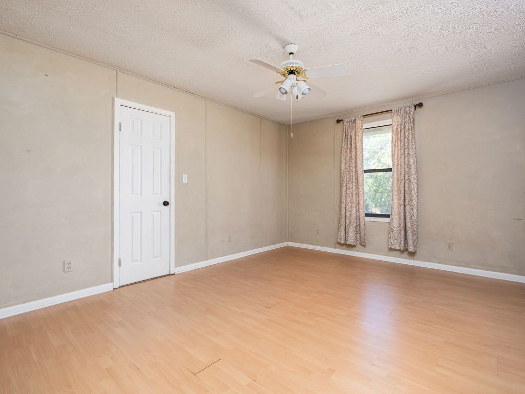 1949 County Road 347 Loop Gause, TX 77857 - Photo 14 of 32 a view of an empty room with a window