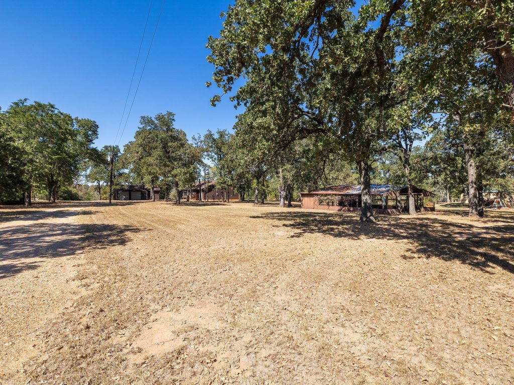1949 County Road 347 Loop Gause, TX 77857 - Photo 2 of 32 a view of road with trees