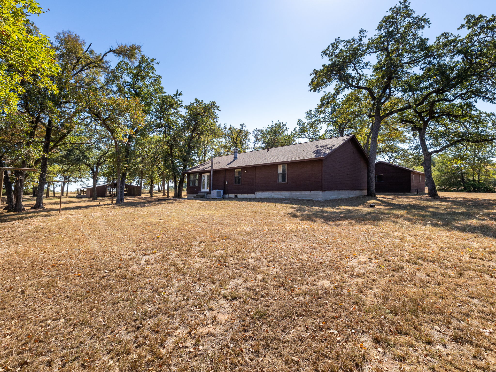 1949 County Road 347 Loop Gause, TX 77857 - Photo 26 of 32 a house view with a outdoor space