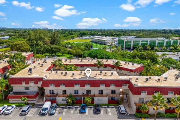 a kitchen with a stove and a microwave