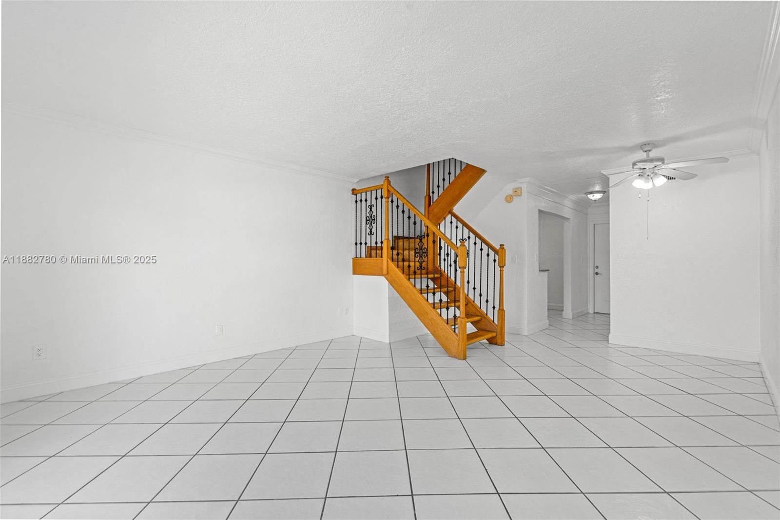 8650 Southwest 67th Avenue, Unit 1027 Pinecrest, FL 33156 - Photo 11 of 41 a view of an entryway with wooden floor