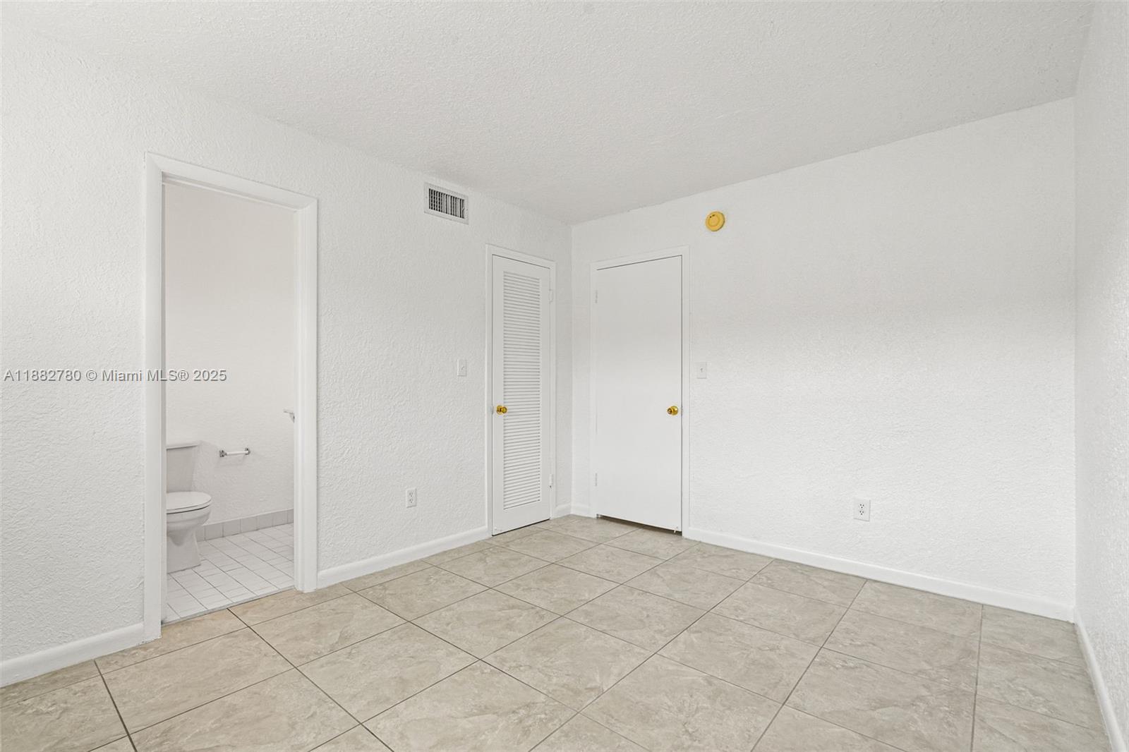 8650 Southwest 67th Avenue, Unit 1027 Pinecrest, FL 33156 - Photo 21 of 41 a view of an empty room